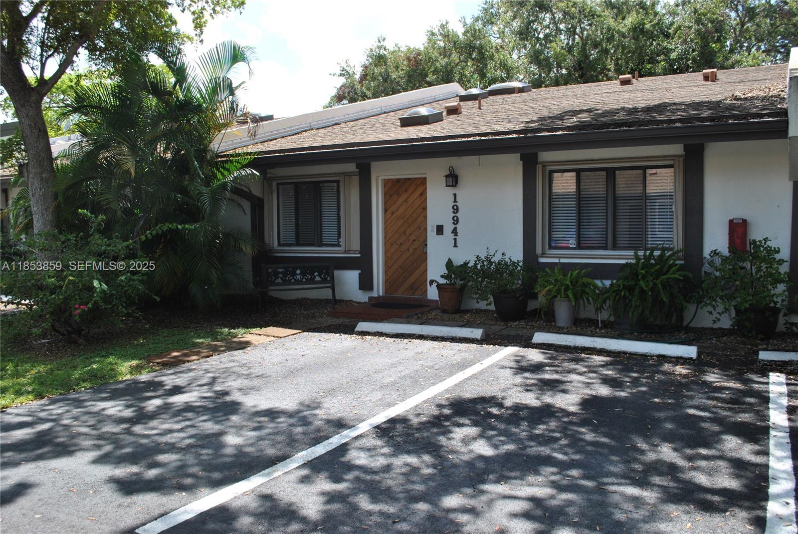 19941 Northeast 5th Court, Unit 3M Miami, FL 33179 - Photo 2 of 25 a front view of a house