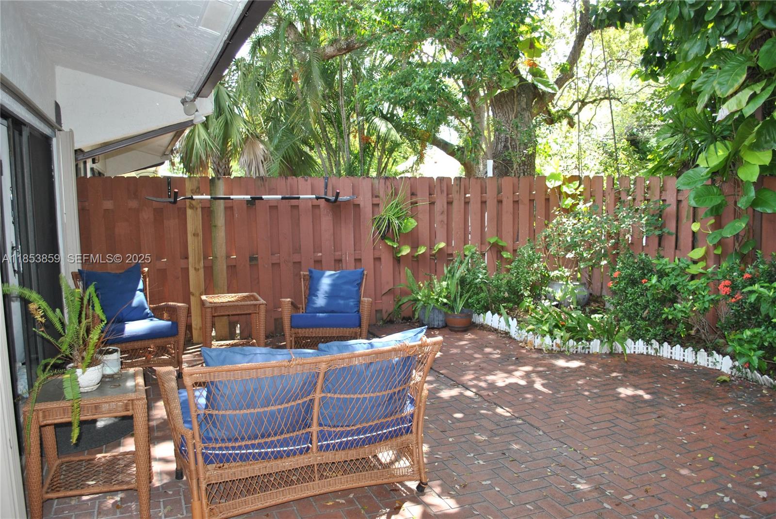 19941 Northeast 5th Court, Unit 3M Miami, FL 33179 - Photo 22 of 25 a view of backyard with outdoor seating and green space