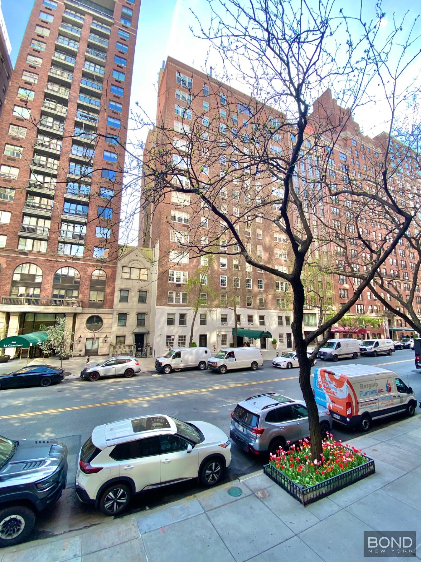 345 East 72nd Street, Unit 2A Manhattan, NY 10021 - Photo 1 of 10 a car parked on the side of a street