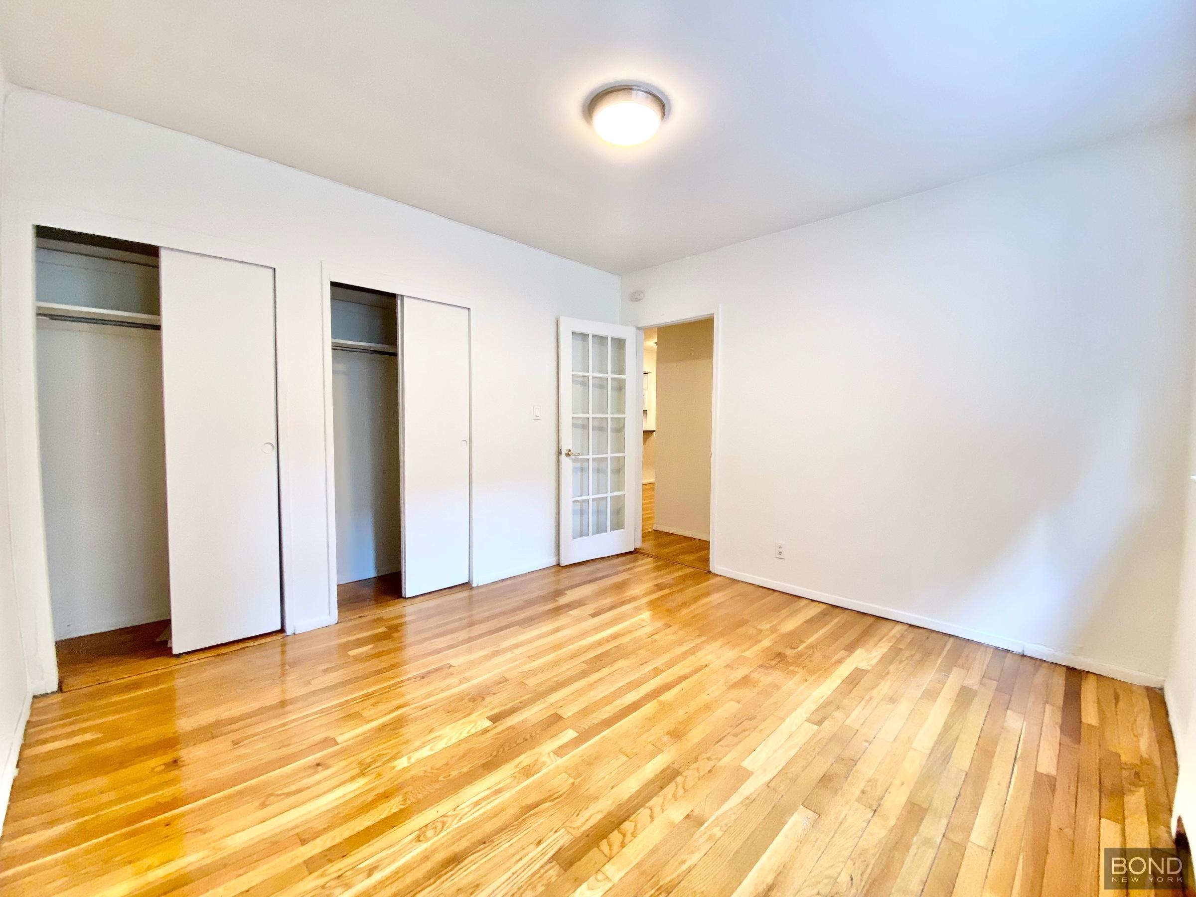 345 East 72nd Street, Unit 2A Manhattan, NY 10021 - Photo 5 of 10 a view of an empty room