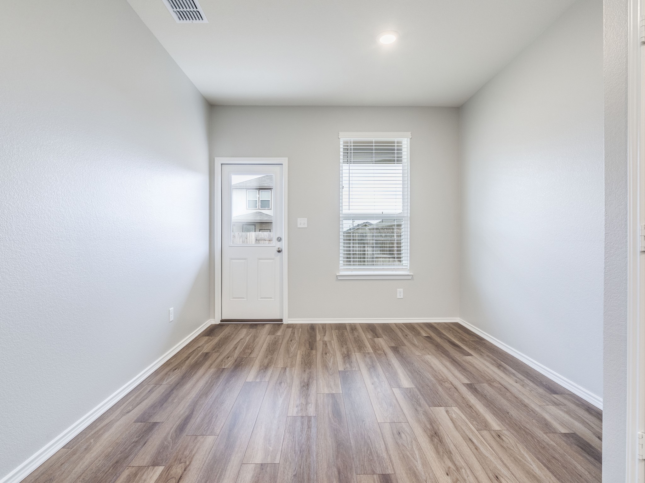 388 Begonia Street Buda, TX 78610 - Photo 10 of 21 Entrance foyer featuring light wood-style flooring and baseboards