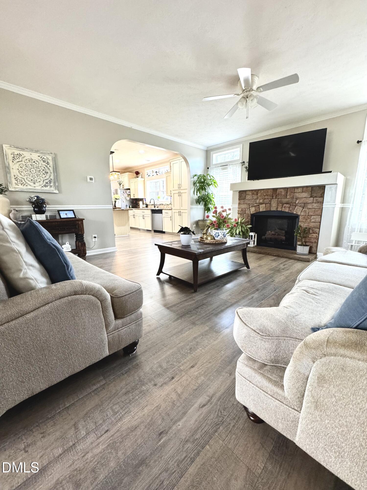 640 Tart Town Road Dunn, NC 28334 - Photo 13 of 71 a living room with furniture and a fireplace