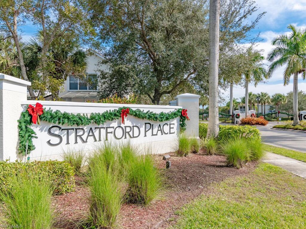 953 Hampton Circle, Unit 112 Naples, FL 34105 - Photo 26 of 35 a sign that is on the side of the road