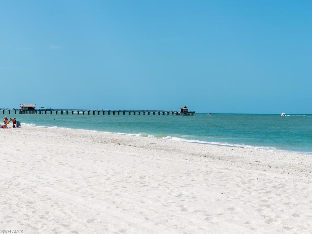 953 Hampton Circle, Unit 112 Naples, FL 34105 - Photo 32 of 35 a view of a lake view