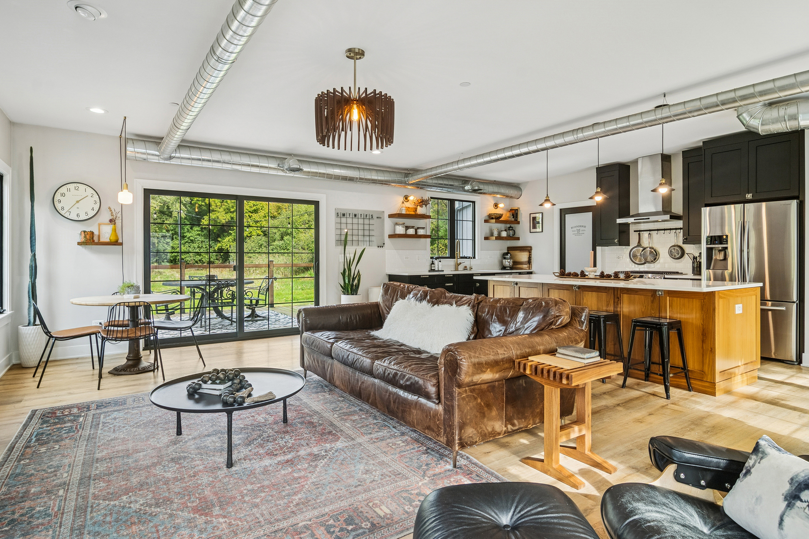 21318 Illinois Rte 59 Barrington, IL 60010 - Photo 14 of 42 a living room with furniture and a large window
