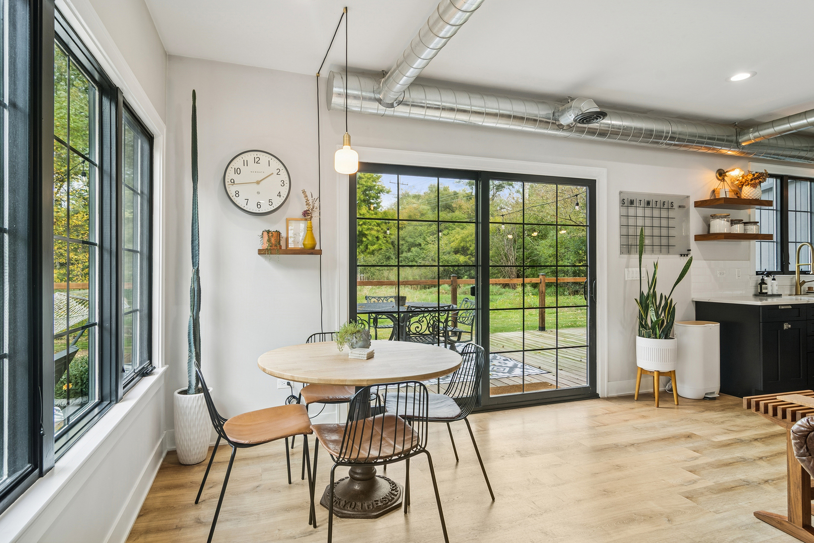 21318 Illinois Rte 59 Barrington, IL 60010 - Photo 15 of 42 a view of a dining room with furniture window and outside view