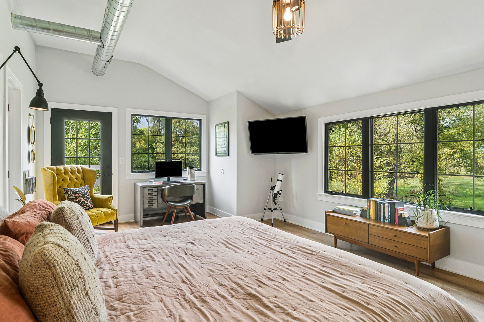 21318 Illinois Rte 59 Barrington, IL 60010 - Photo 21 of 42 a bedroom with a bed and glass window