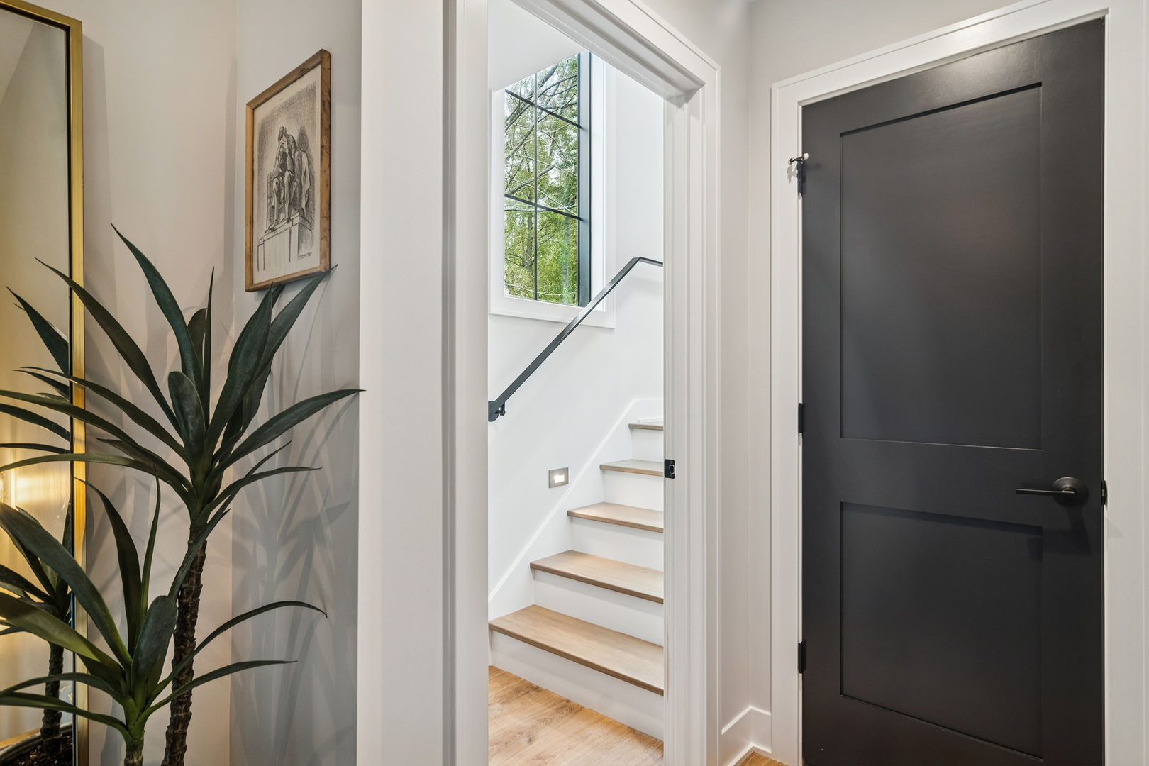 21318 Illinois Rte 59 Barrington, IL 60010 - Photo 29 of 42 a view of staircase with wooden floor and window