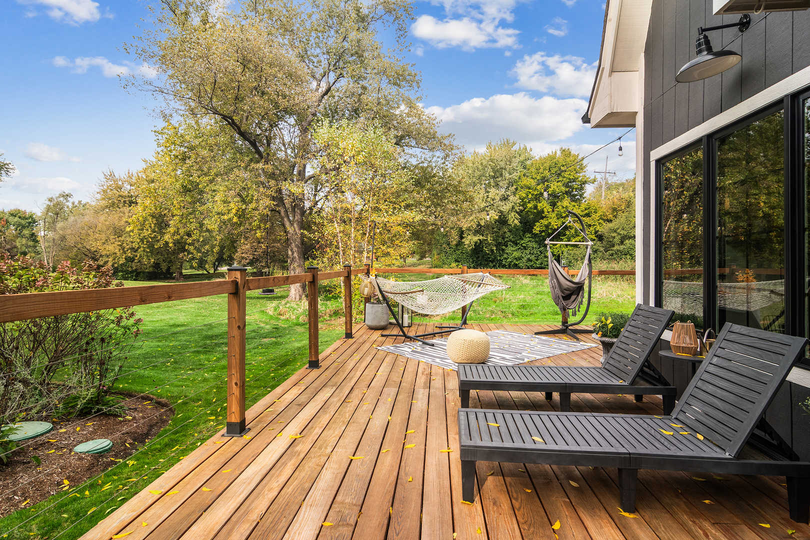 21318 Illinois Rte 59 Barrington, IL 60010 - Photo 34 of 42 a view of a patio with wooden floor table and chairs