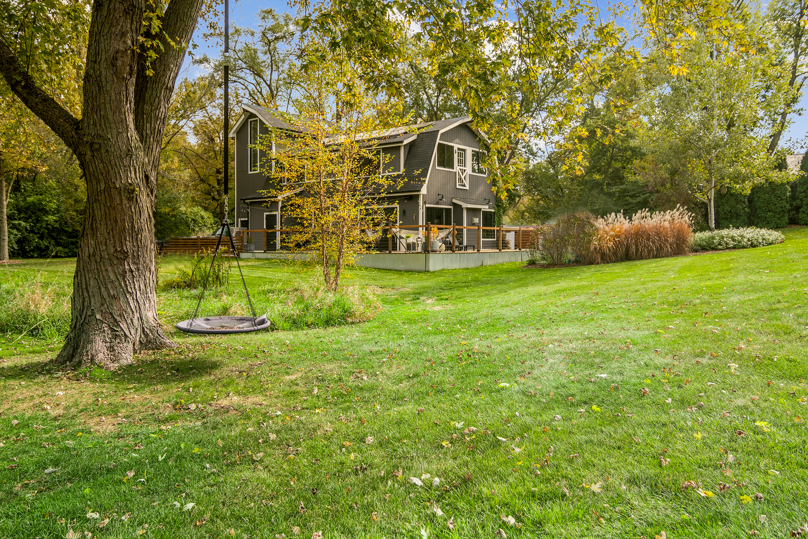 21318 Illinois Rte 59 Barrington, IL 60010 - Photo 37 of 42 a view of a house with a big yard and large trees