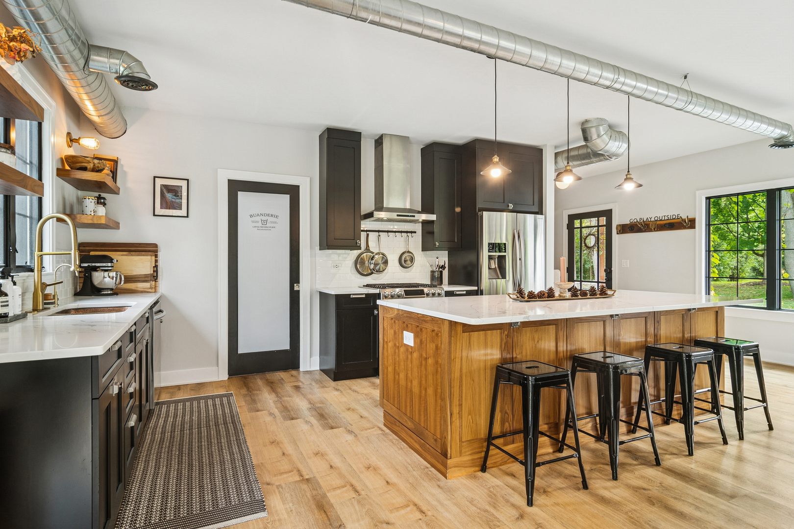 21318 Illinois Rte 59 Barrington, IL 60010 - Photo 6 of 42 a kitchen with a table chairs sink and cabinets