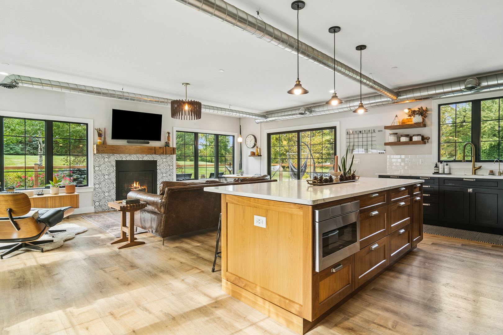 21318 Illinois Rte 59 Barrington, IL 60010 - Photo 7 of 42 a kitchen with stainless steel appliances granite countertop a stove and a refrigerator