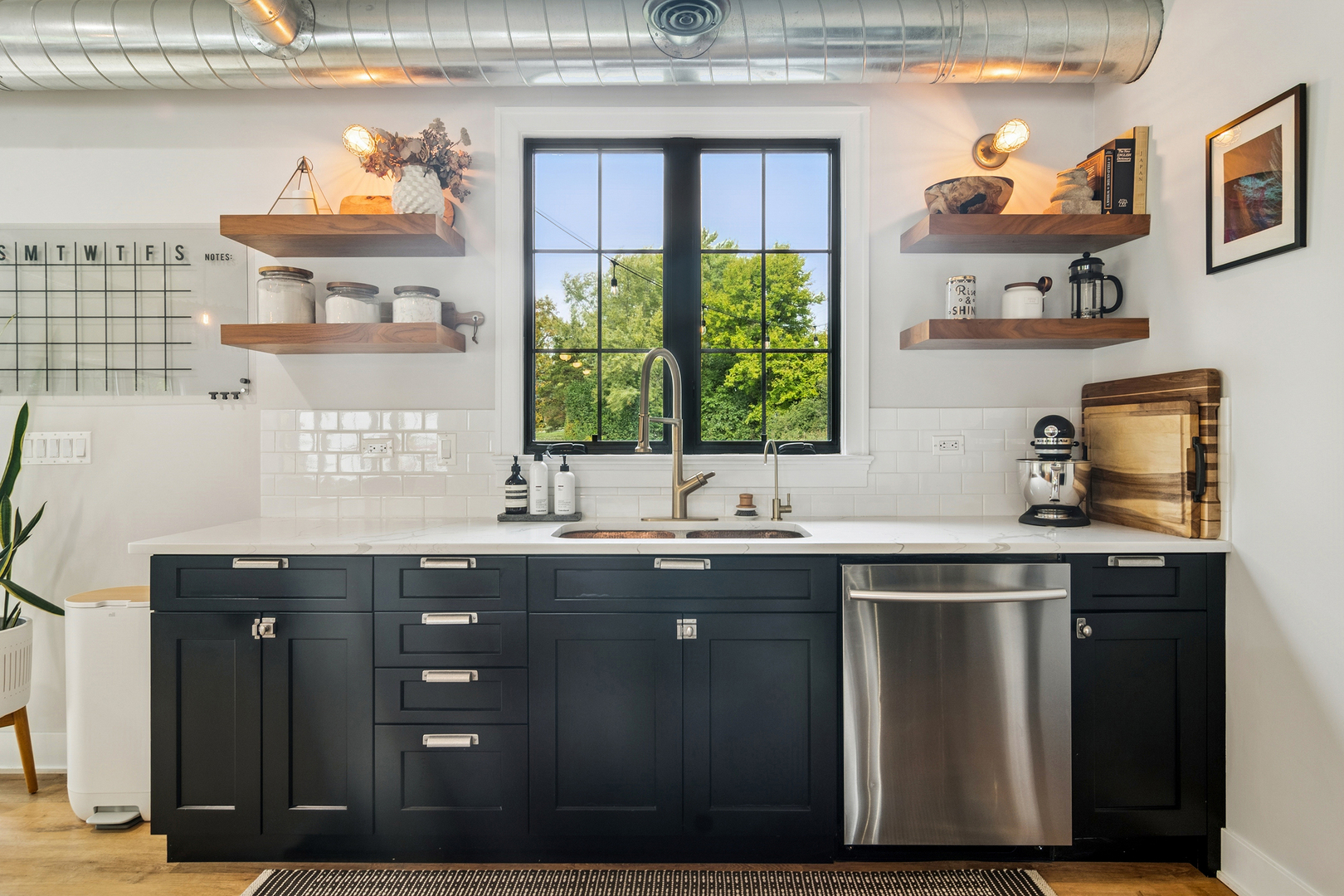 21318 Illinois Rte 59 Barrington, IL 60010 - Photo 9 of 42 a kitchen with stainless steel appliances granite countertop a sink a stove and a wooden cabinets