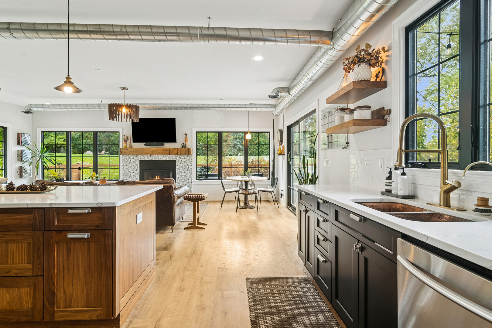 21318 Illinois Rte 59 Barrington, IL 60010 - Photo 10 of 42 a open kitchen with stainless steel appliances granite countertop a sink and cabinets