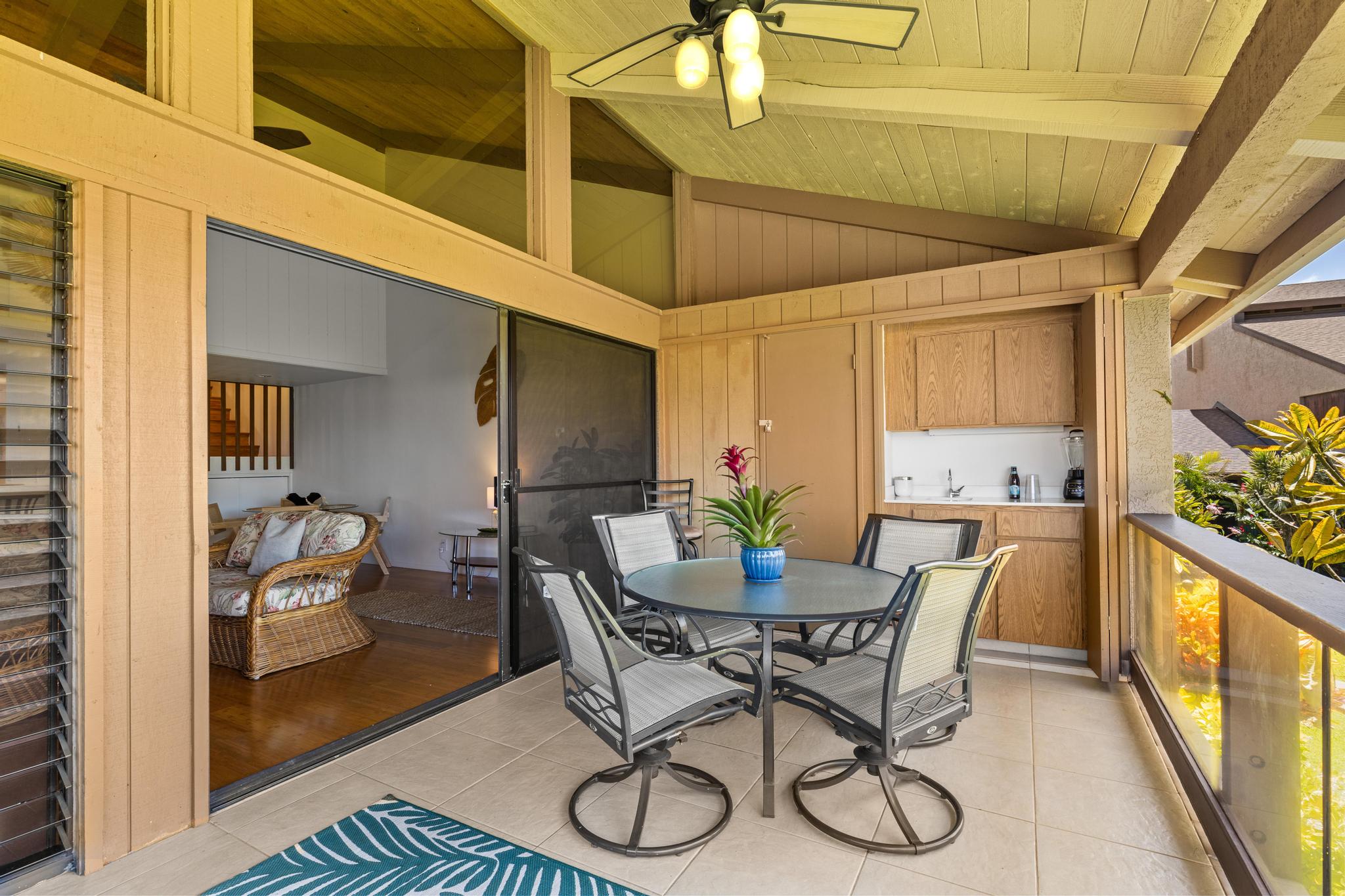 68-3840 Lua Kula Street, Unit F203 Waikoloa, HI 96738 - Photo 2 of 29 a view of a dining room with furniture and a window
