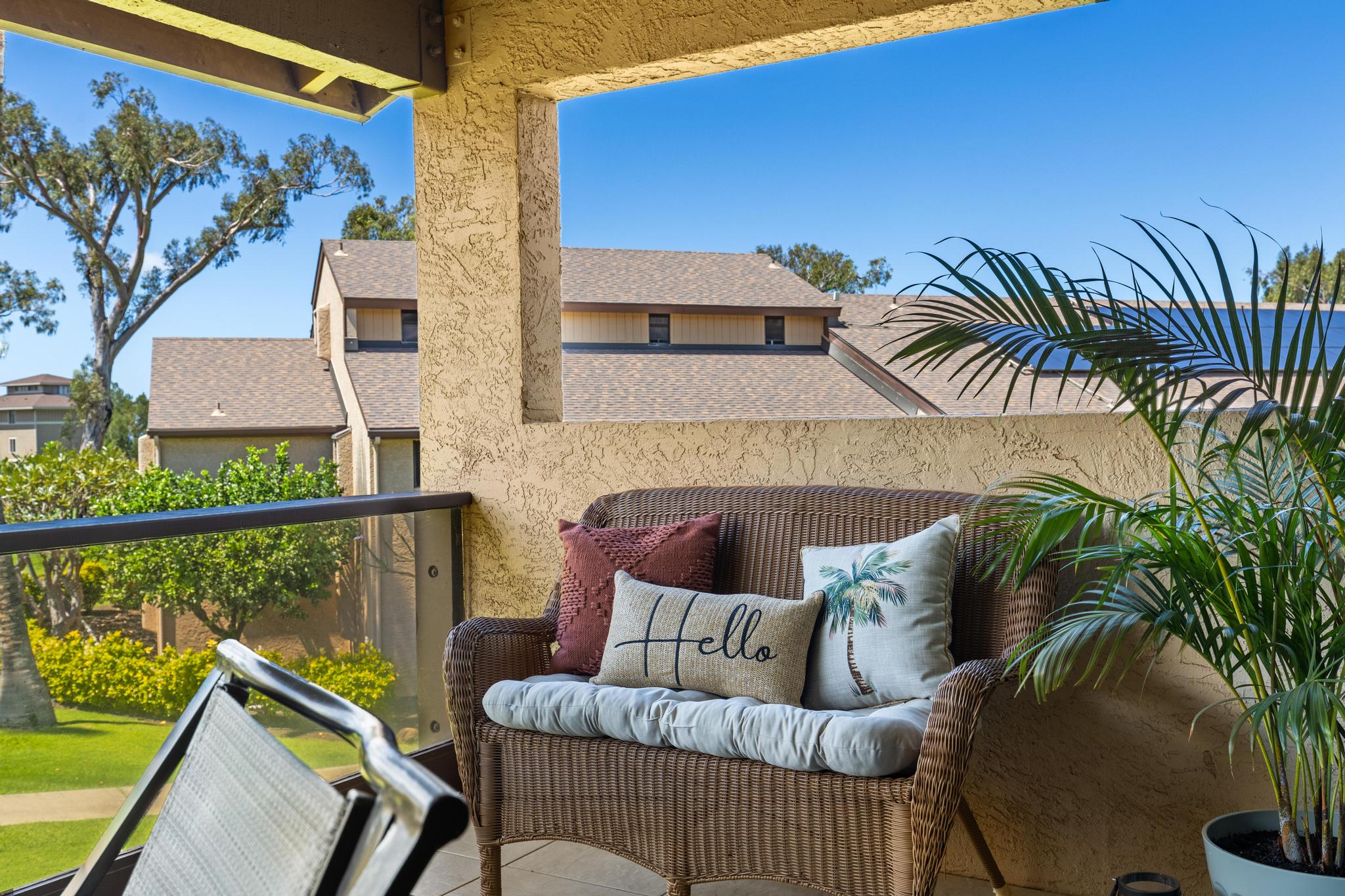 68-3840 Lua Kula Street, Unit F203 Waikoloa, HI 96738 - Photo 3 of 29 a view of a balcony with furniture and a potted plant