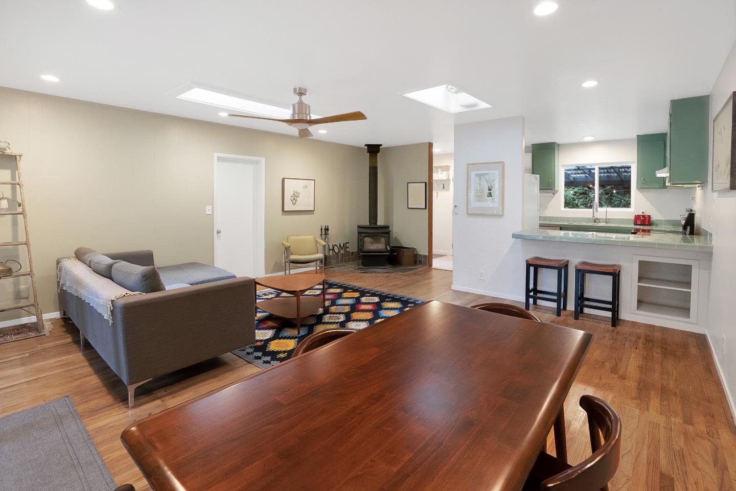 845 Redwood Road Felton, CA 95018 - Photo 13 of 28 a living room with furniture and a flat screen tv