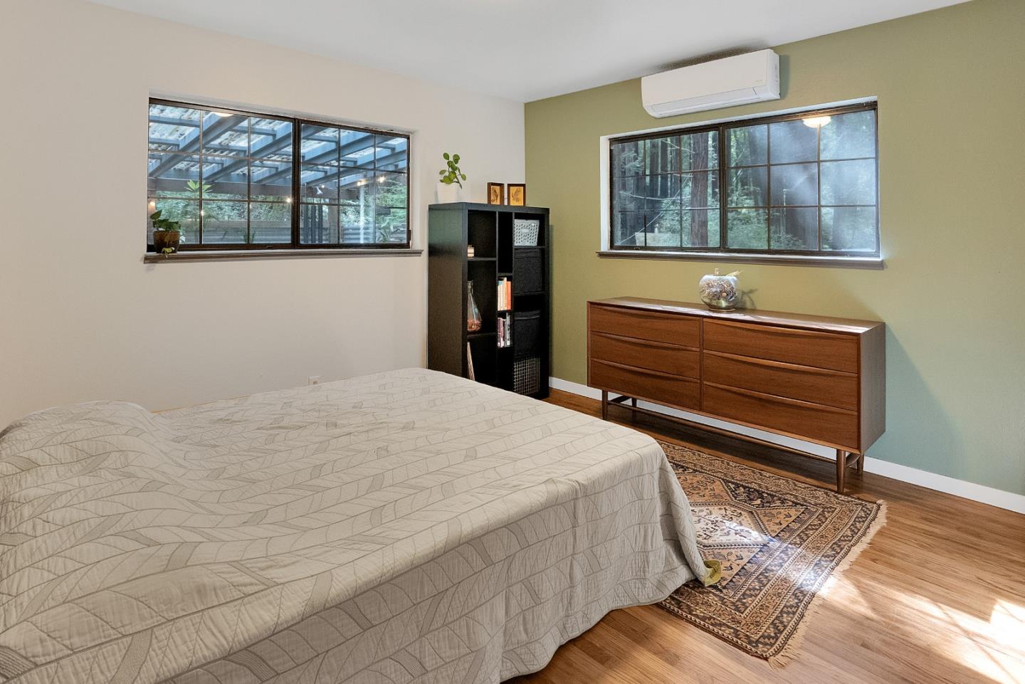 845 Redwood Road Felton, CA 95018 - Photo 20 of 28 a bedroom with a bed and wooden floor