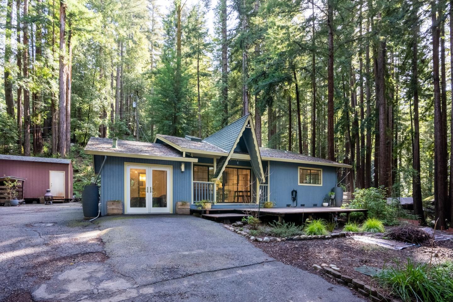 845 Redwood Road Felton, CA 95018 - Photo 2 of 28 a view of a house with backyard and garden