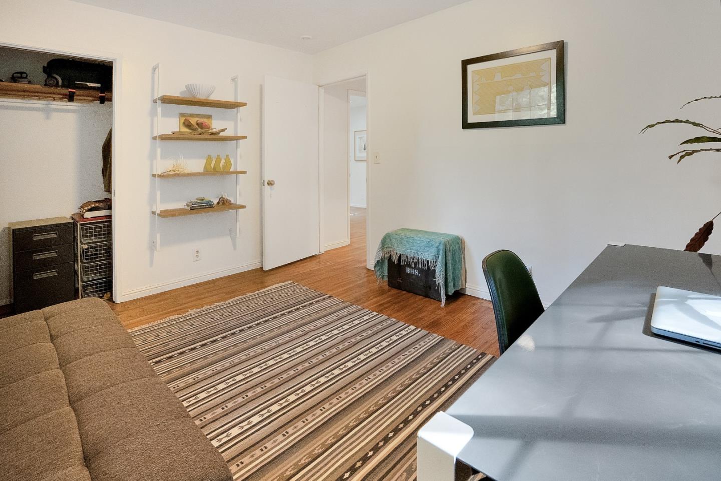 845 Redwood Road Felton, CA 95018 - Photo 23 of 28 a bedroom with bed and cabinets