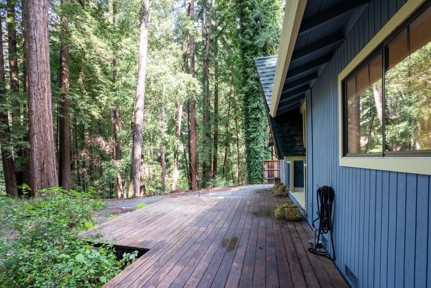 845 Redwood Road Felton, CA 95018 - Photo 25 of 28 a view of backyard with a deck and wooden floor