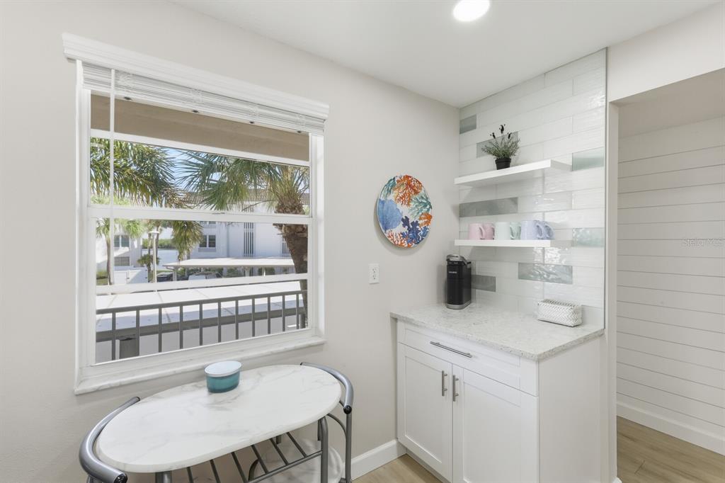 4380 Exeter Drive, Unit H202 Longboat Key, FL 34228 - Photo 13 of 37 a kitchen with a sink and a stove