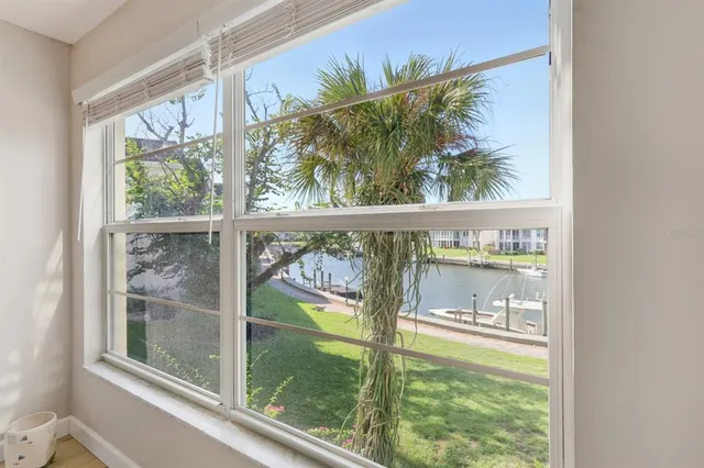 a bathroom with a granite countertop sink a mirror and a vanity