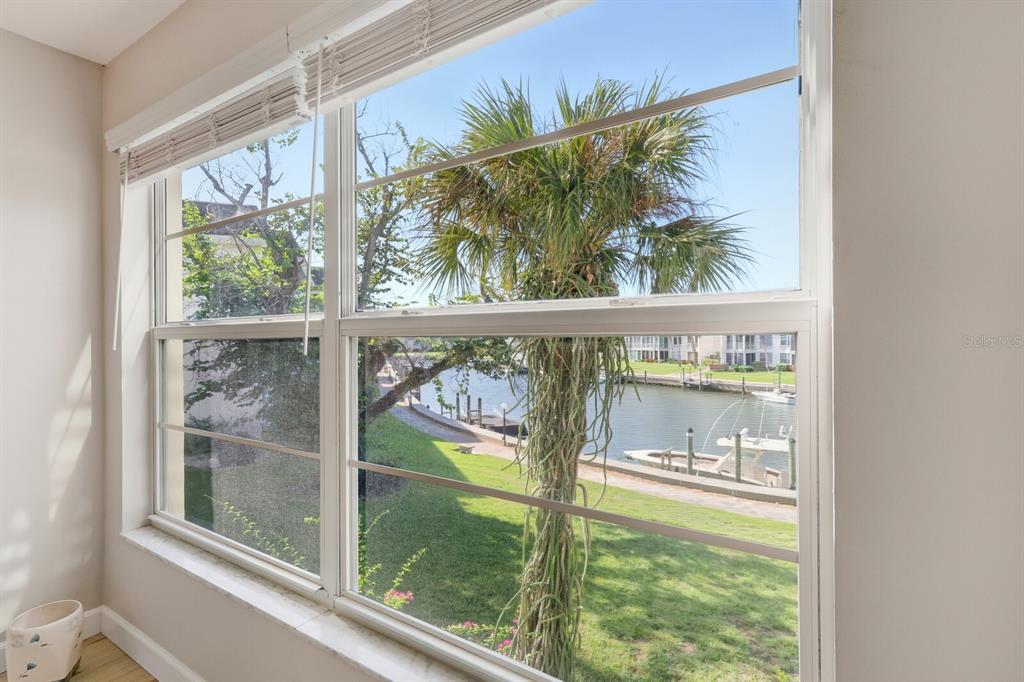 4380 Exeter Drive, Unit H202 Longboat Key, FL 34228 - Photo 19 of 37 a view of swimming pool from a window