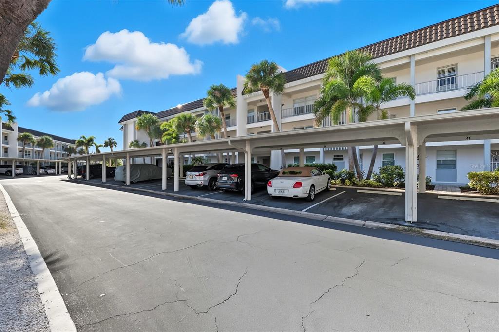 4380 Exeter Drive, Unit H202 Longboat Key, FL 34228 - Photo 2 of 37 a view of a street with a building