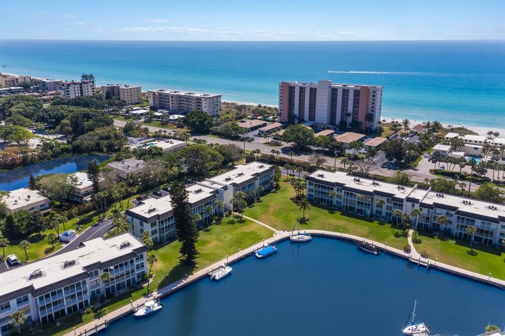 4380 Exeter Drive, Unit H202 Longboat Key, FL 34228 - Photo 30 of 37 a view of a city with an ocean