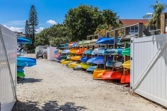 an aerial view of a house a yard and a wooden floor