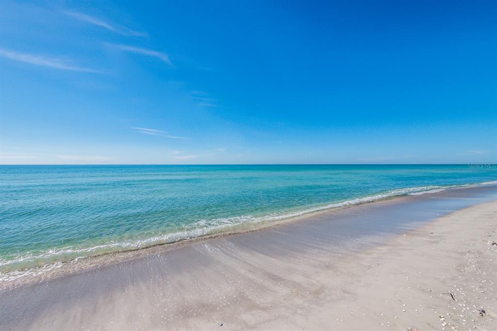 4380 Exeter Drive, Unit H202 Longboat Key, FL 34228 - Photo 37 of 37 a view of beach and ocean