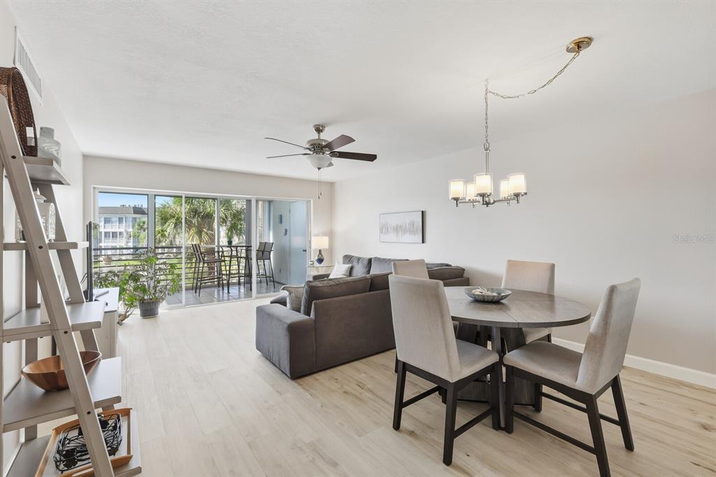 4380 Exeter Drive, Unit H202 Longboat Key, FL 34228 - Photo 5 of 37 a view of a livingroom and dining room