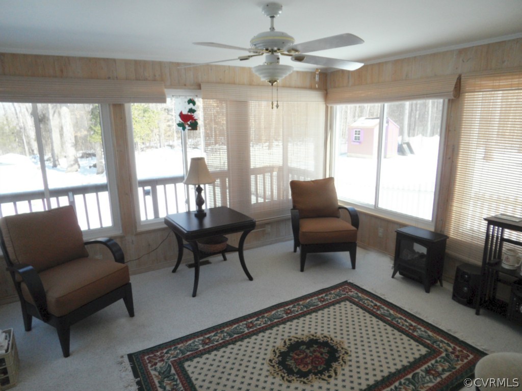 7118 Barkbridge Road Chesterfield, VA 23832 - Photo 19 of 24 a living room with furniture and a rug