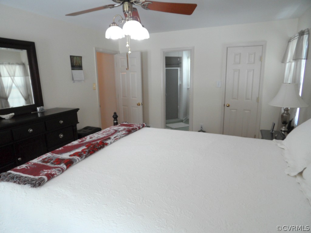 7118 Barkbridge Road Chesterfield, VA 23832 - Photo 20 of 24 a bedroom with a bed and a dresser