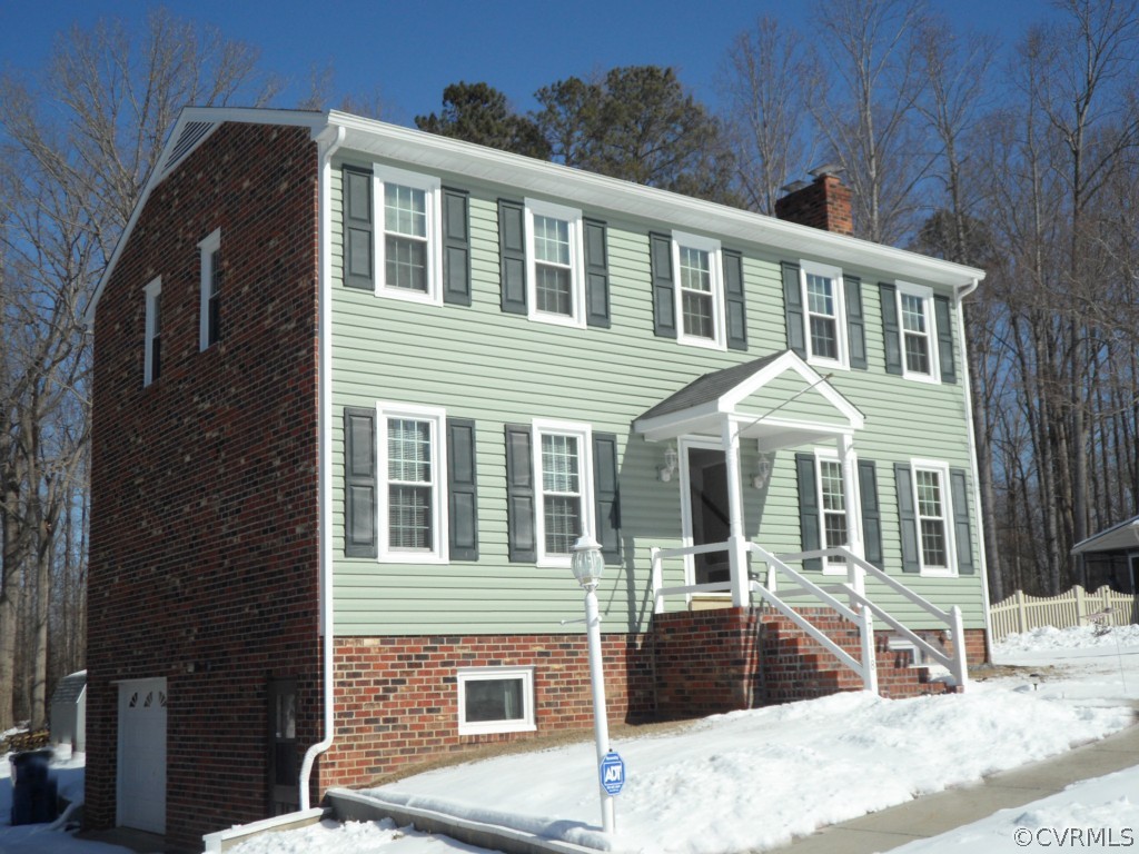 7118 Barkbridge Road Chesterfield, VA 23832 - Photo 22 of 24 a front view of a house with a yard