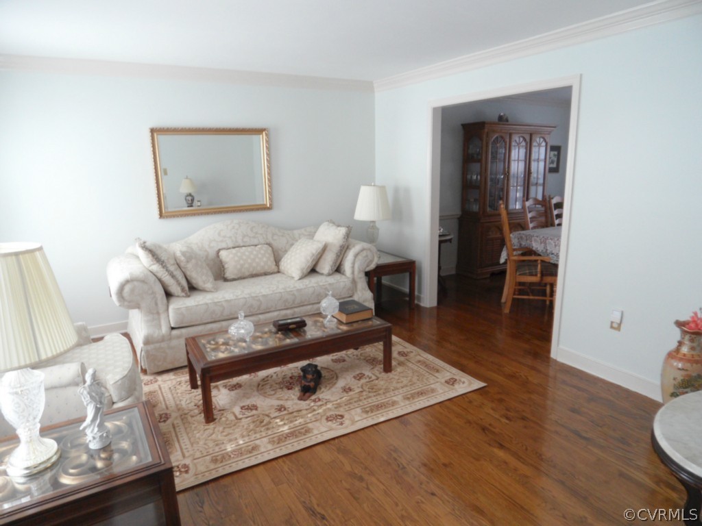 7118 Barkbridge Road Chesterfield, VA 23832 - Photo 3 of 24 a living room with furniture and wooden floor