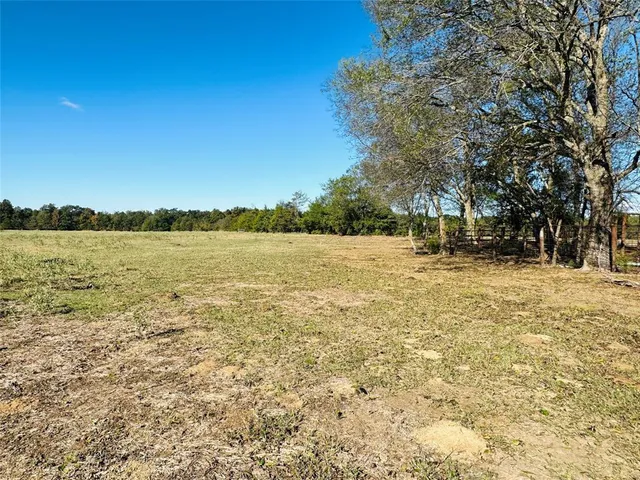 a view of lake with green space