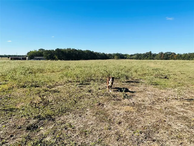 a view of lake with mountain in background