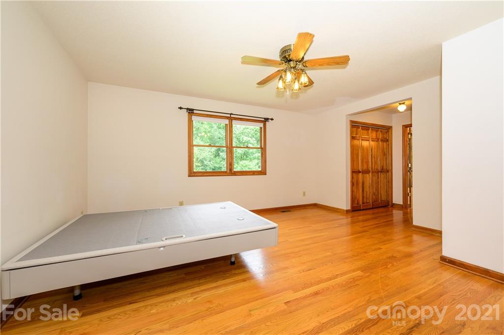 195 Umberger Road Mount Ulla, NC 28125 - Photo 22 of 48 an empty room with windows