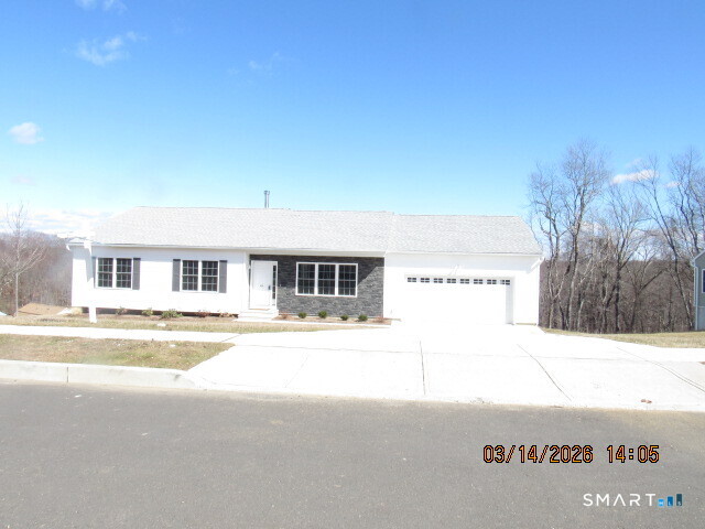 73 Warm Earth Road Naugatuck, CT 06770 - Photo 1 of 24 a view of a house with a yard