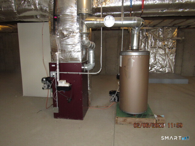 73 Warm Earth Road Naugatuck, CT 06770 - Photo 18 of 23 Hot air furnace and oil hot water heater