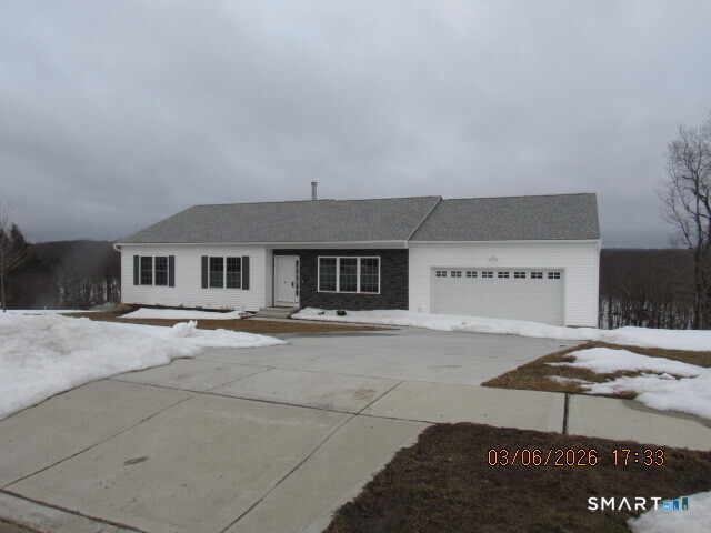 73 Warm Earth Road Naugatuck, CT 06770 - Photo 2 of 24 a view of a house with a patio