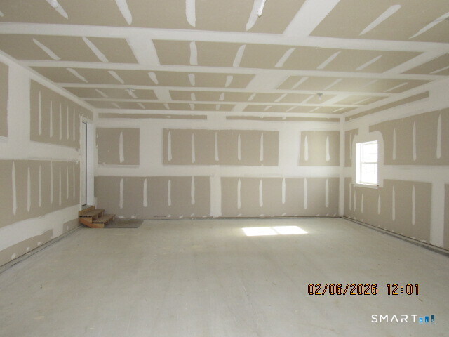 73 Warm Earth Road Naugatuck, CT 06770 - Photo 22 of 24 a view of an empty room with a window