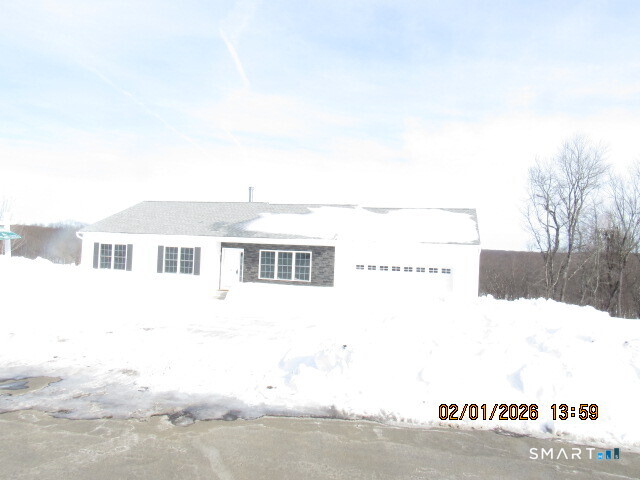 73 Warm Earth Road Naugatuck, CT 06770 - Photo 23 of 24 a view of building with yard