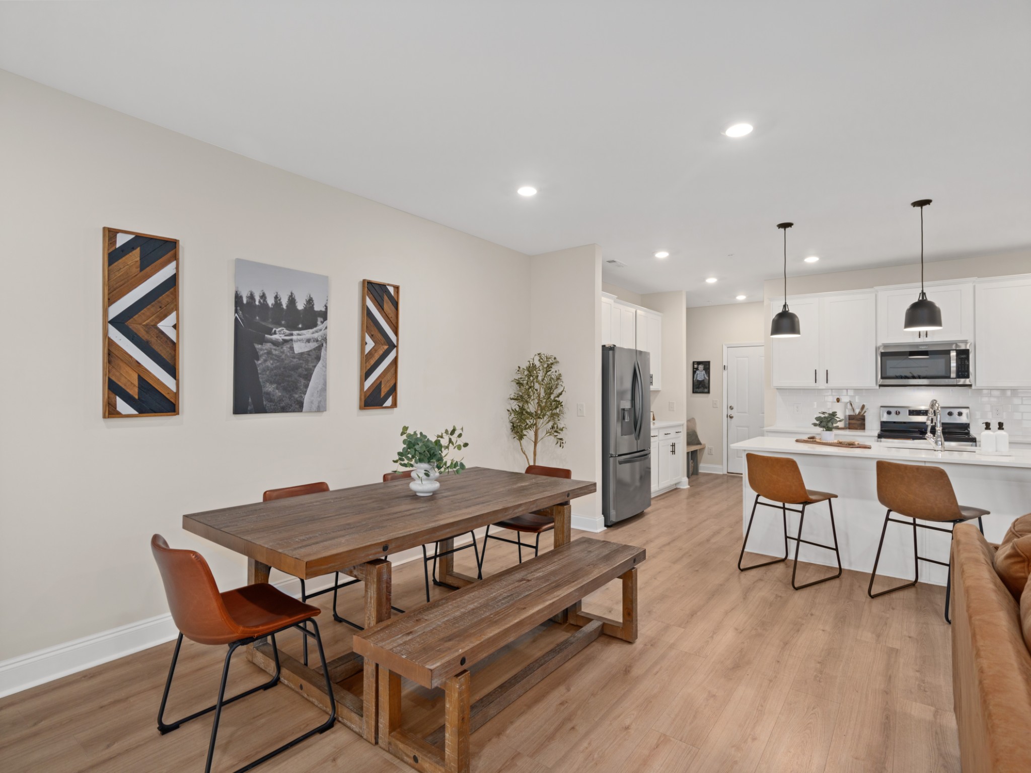 1043 June Wilde Ridge Spring Hill, TN 37174 - Photo 15 of 35 a dining room with furniture and wooden floor