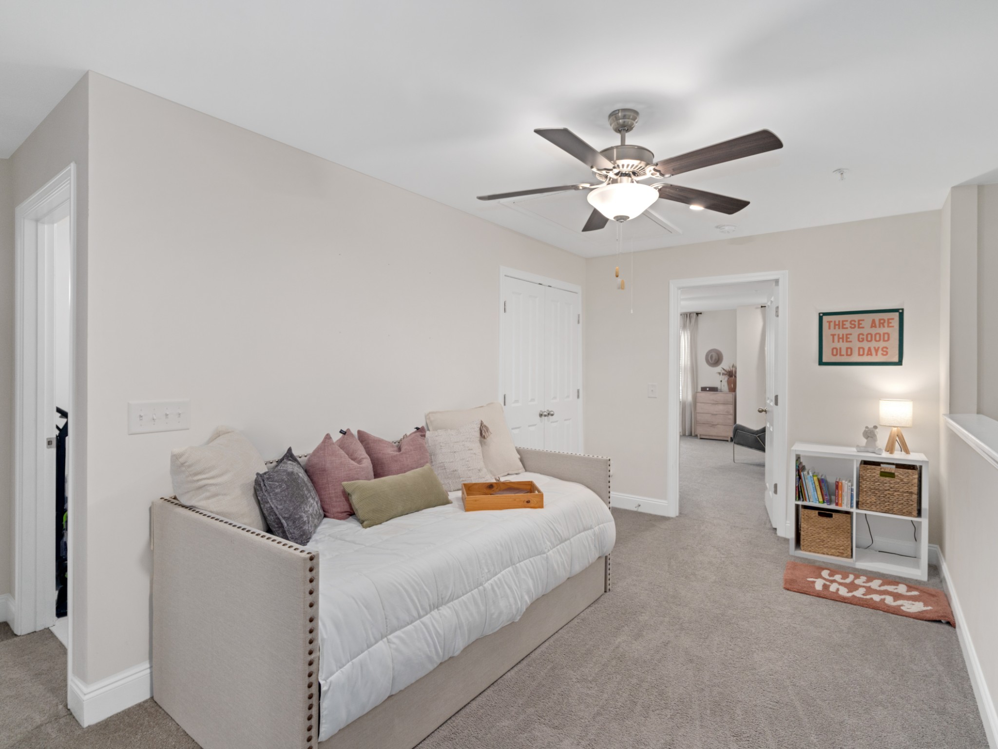 1043 June Wilde Ridge Spring Hill, TN 37174 - Photo 20 of 35 a bedroom with furniture and a chandelier