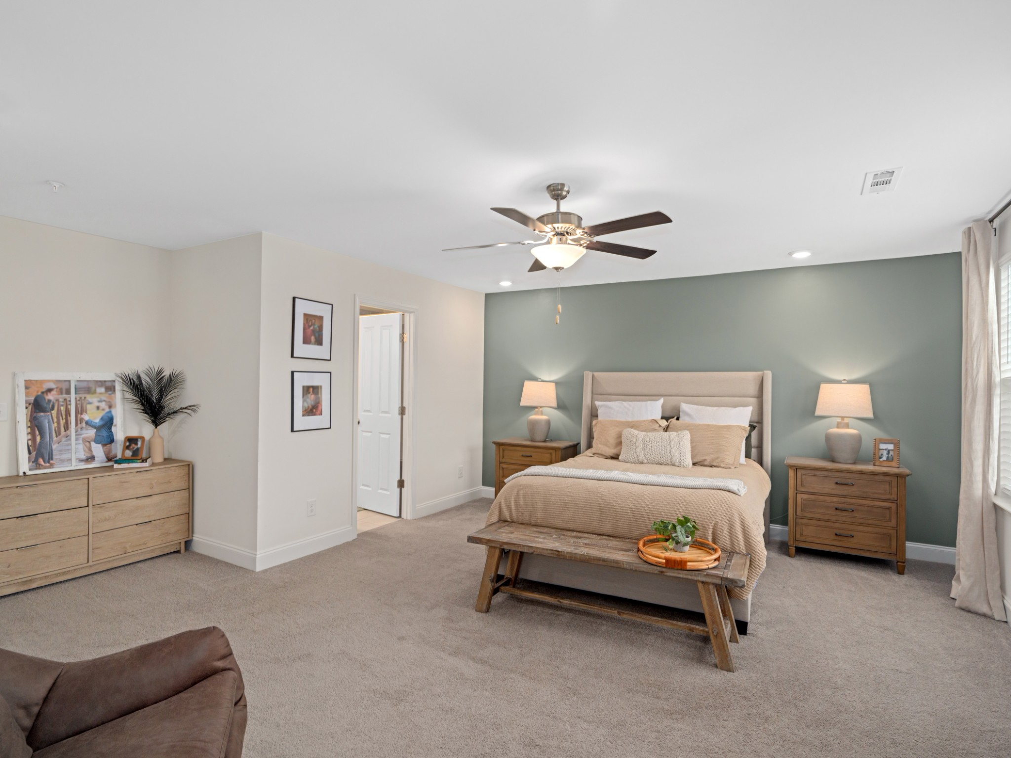1043 June Wilde Ridge Spring Hill, TN 37174 - Photo 22 of 35 a bedroom with a bed and lamp