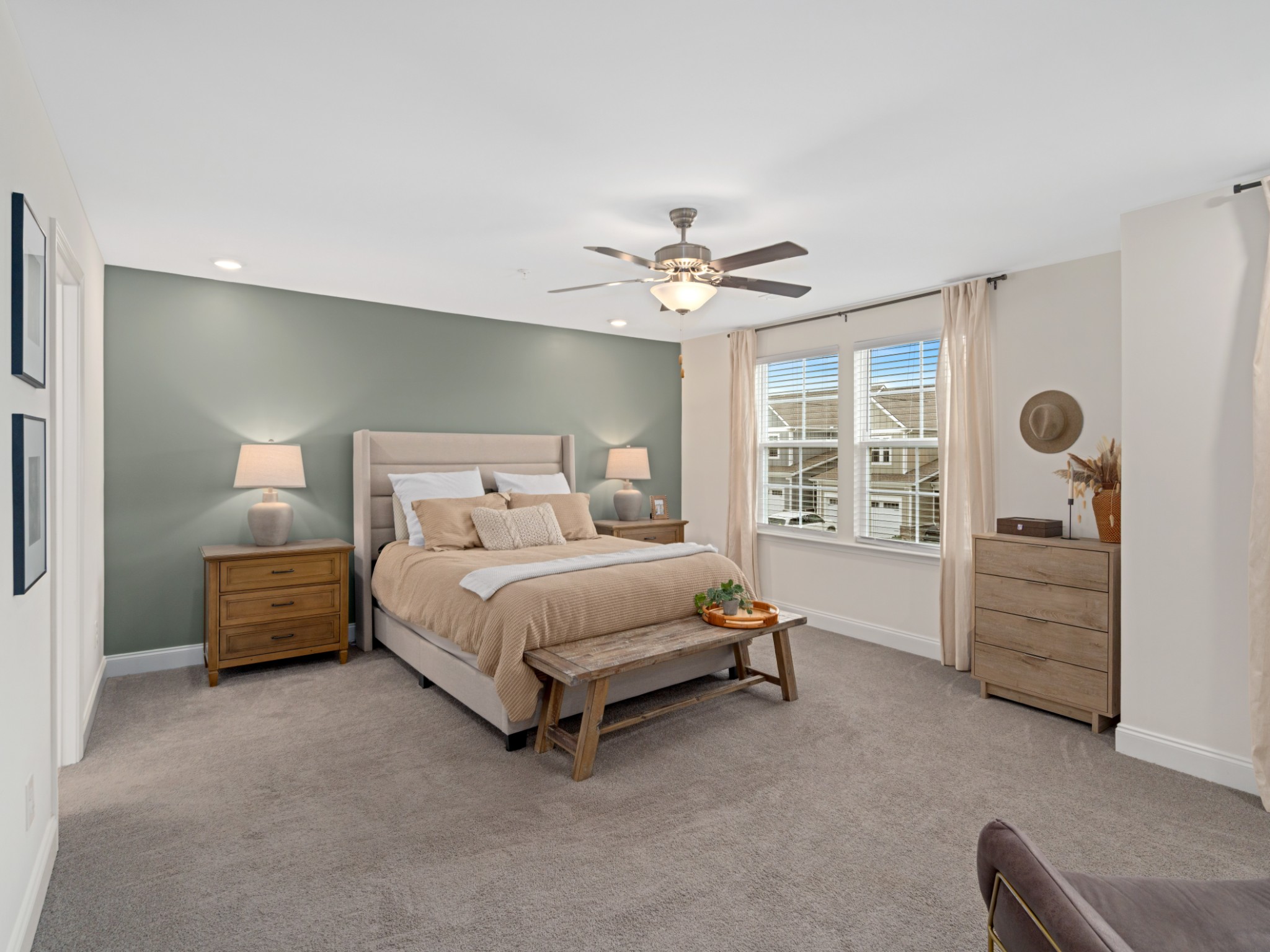 1043 June Wilde Ridge Spring Hill, TN 37174 - Photo 24 of 35 a spacious bedroom with a bed and a chandelier