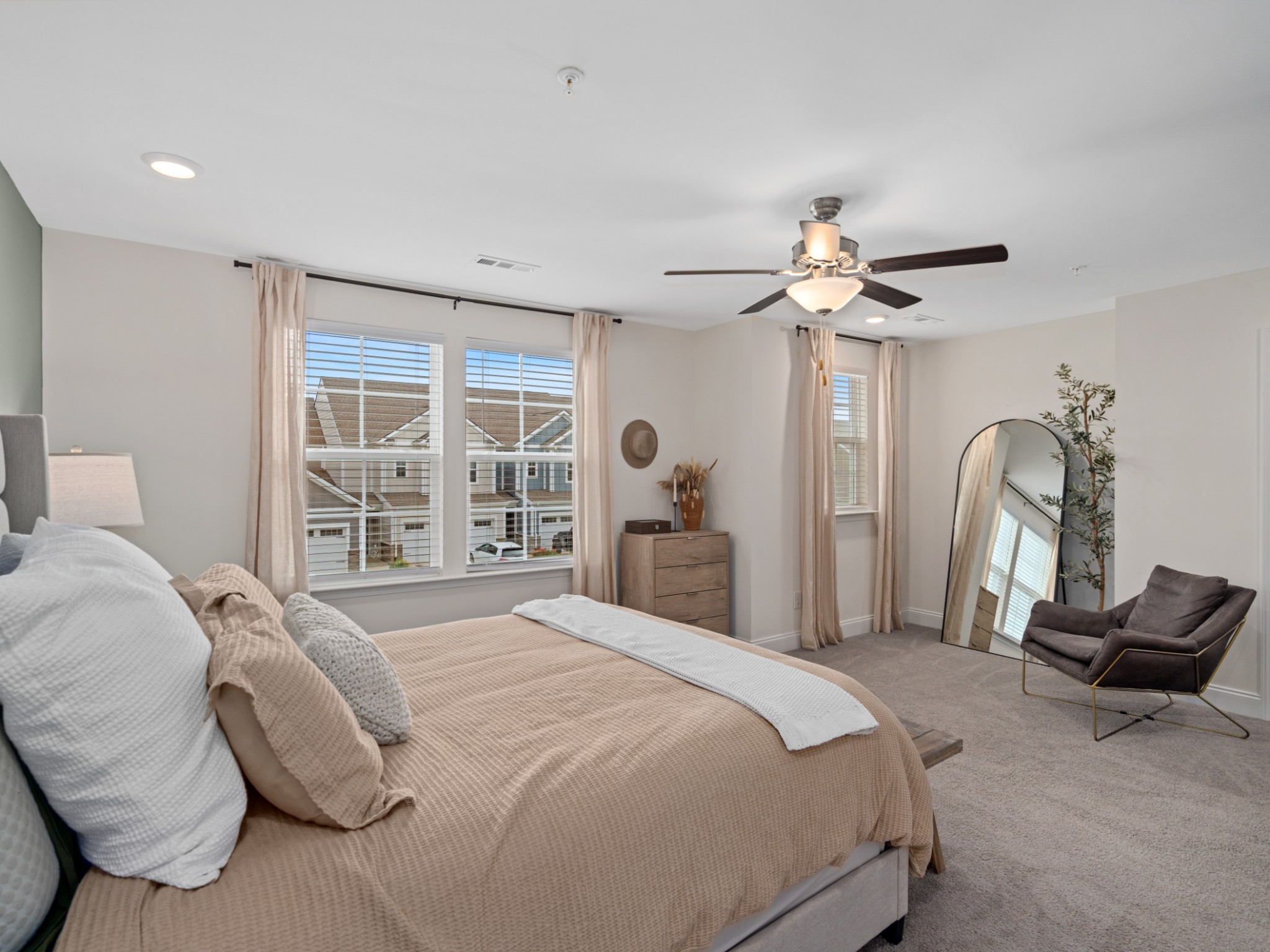 1043 June Wilde Ridge Spring Hill, TN 37174 - Photo 25 of 35 a bedroom with a bed and a chandelier